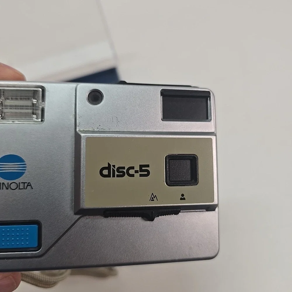 Minolta Disc‎ 5 Disc Film Camera, silver, with Case